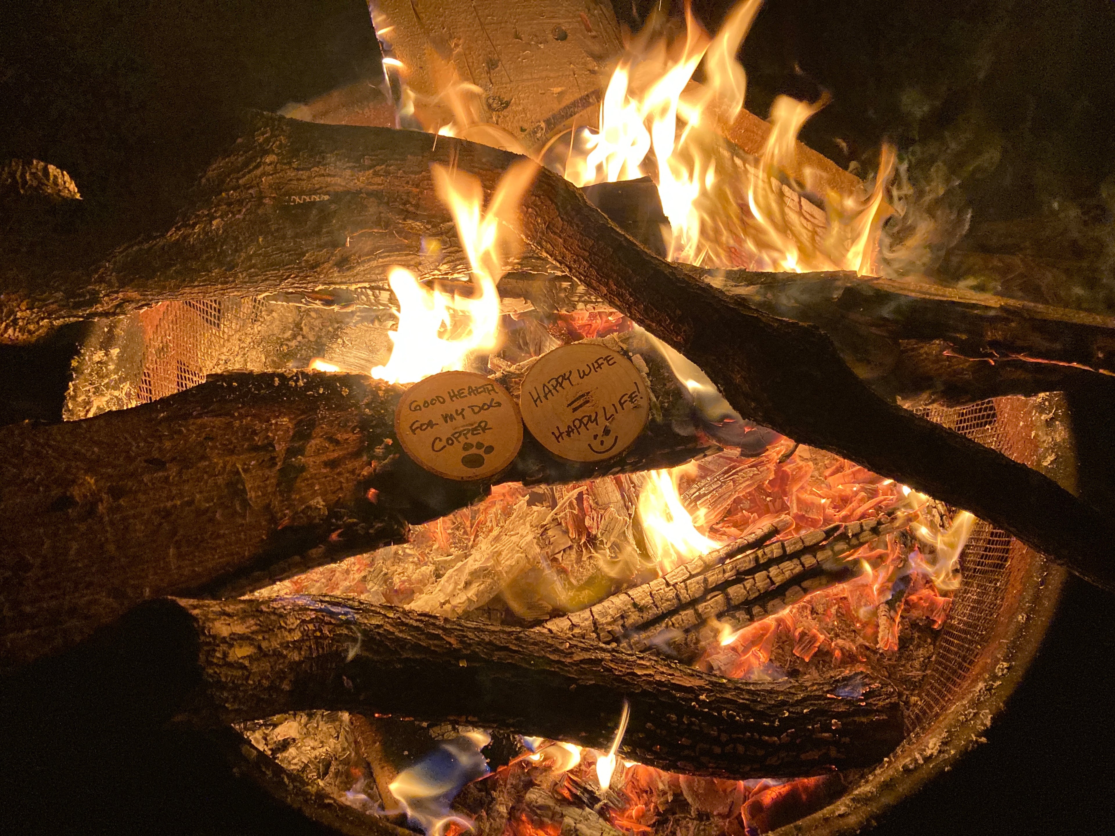 <img src="wish-for-dog-wife-around-campfire_jpg” alt="wishing my dog and wife have good health around our campfire - wish wood - for making memories and experiences"/>