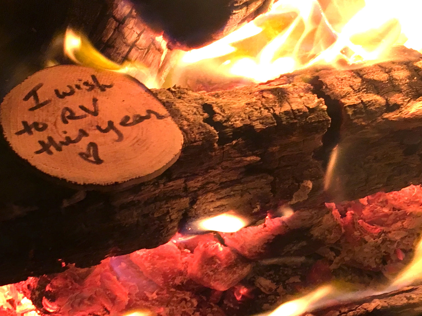 <img src="fire-outside-nature-wishes-experience_jpg” alt="enjoying nature outside around a campfire making wishes - wish wood - for making memories and experiences"/>